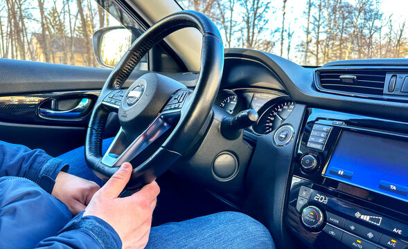the driver in the wrong position at the wheel of the car