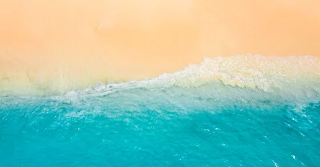 Fotobehang Peaceful aerial wide beach landscape, summer vacation Mediterranean holiday. Waves crash amazing blue ocean bay sea panoramic coastline. Tranquil aerial drone top view. Relaxing sunny beach, seaside © icemanphotos