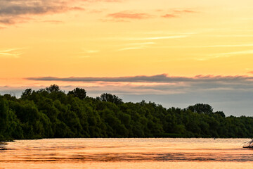 Sunrise over the Danube in the Danube Delta Biosphere Reserve, Delta Dunarii near Tulcea,...