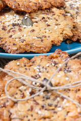 Fresh oatmeal cookies with honey and healthy seeds. Delicious crunchy dessert