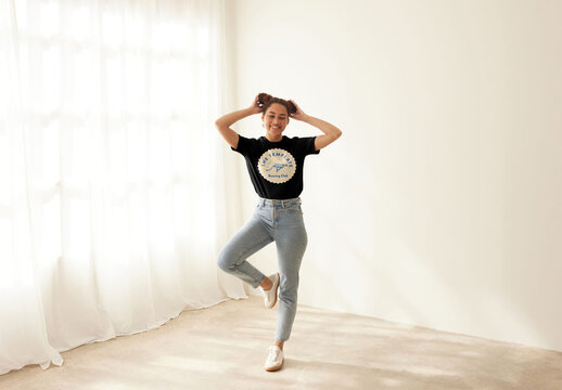 Mockup of woman wearing customizable t-shirt on one leg