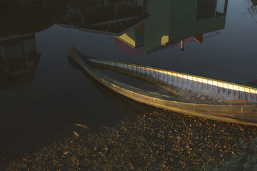 A view of a rowboat on the shore of the Venice Canals.