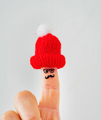 funny finger character in hat