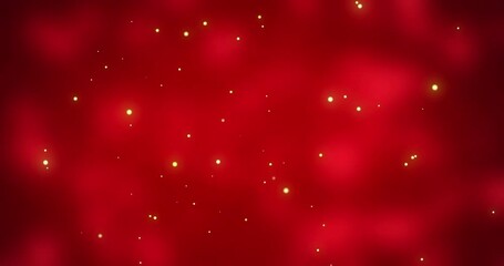 Glowing white christmas light particles moving across red bokeh background