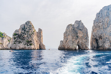 Fototapeta na wymiar Famous Faraglioni Rocks, Capri island, Italy