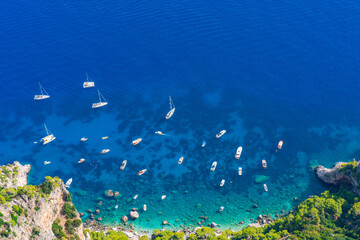 Fototapeta na wymiar Aerial view of Bay of Naples with boats and yachts seen from Mount Solaro on Capri, Italy