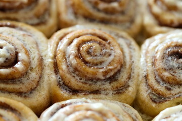 Freshly baked cinnamon rolls or Cinnabon close up