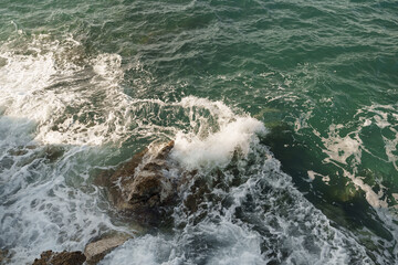 Fresnch Riviera cliffs with sea waves crushing on them