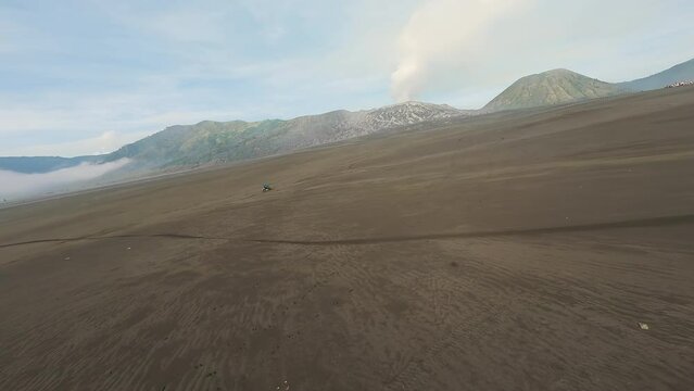 Motocross at the foot of a volcano in Indonesia. Video from the FPV drone.
