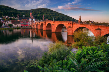 Fototapeta na wymiar Heidelberg, Germany. Cityscape image of historical city of Heidelberg, Germany with Old Bridge Gate at autumn sunrise.