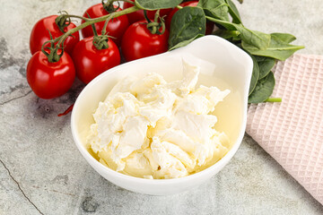 Soft cream cheese in the bowl
