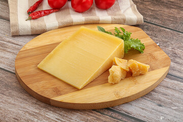 Parmesan hard cheese with small pieces