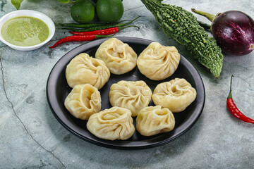 Nepali steamed dumplings  Momo with sause