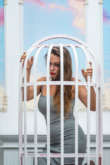 Beautiful woman in cage