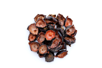 Dried mangosteen peels on white background.