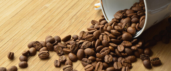 Carefully selected and roasted fresh coffee beans inside the cup