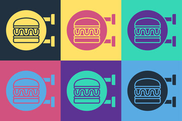 Obraz premium Pop art Online ordering and burger delivery icon isolated on color background. Vector