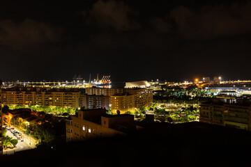 Fototapeta na wymiar Night view of Alicante city, modern buildings. Alicante, Spain cityscape in the night.