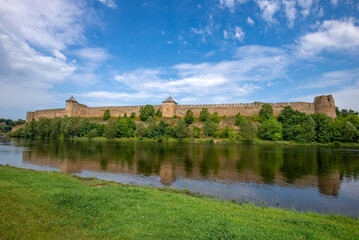 Fototapeta na wymiar The ancient Ivangorod fortress on the bank of the Narova River. Leningrad Region, Russia