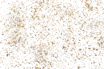 Dried and chopped up basil spice pile isolated on white background, top view
