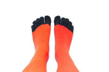 Personal perspective shot of a woman's feet wearing red socks with black toes, toe gloves. Isolated on transparent background, PNG.