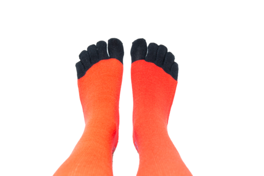 Personal perspective shot of a woman's feet wearing red socks with black toes, toe gloves. Isolated on transparent background, PNG.