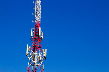 Telecommunication tower under the blue sky