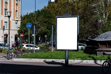 Portrait format billboard in the streets of Milan.