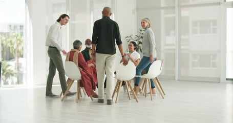 Men, woman and group in circle for counselling with mental health, support and psychology in office. Team building, people and diversity for communication, speaking and trust in therapy and empathy