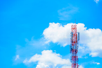 Telecommunication tower pole of mobile phone network with blue sky and cloud