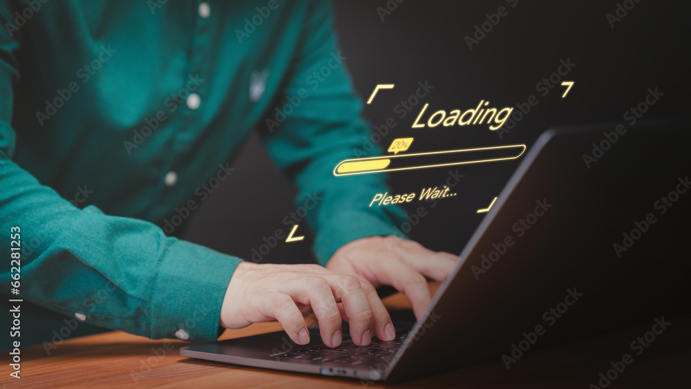 Poster Concept of waiting for load of loading symbol. User man using a laptop computer for download and update software and waiting to loading digital file data form website, very slow internet form wifi.
