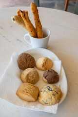 Different types of cookies made from the windmills flour. The windmill of Antimachia on the island...
