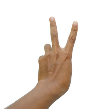 The gesture of the hand. Two fingers raised up. Hand showing victory sign(V sign) on white background. Hand showing the sign of victory and peace closeup.