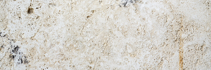 Element of old rough concrete wall as background or texture