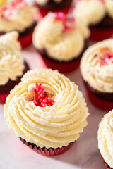 Red Velvet Cupcakes with White Chocolate Ganache Frosting
