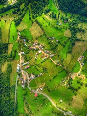 Drone's Eye View: High mountain pass in mountains. Highlands and hills with narrow roads.