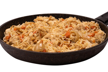 Tasty pilaf with chicken in a frying pan.