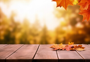 Naklejka na ściany i meble Autumn background with maple leaves on wooden table and bokeh sunlight shine. High quality photo