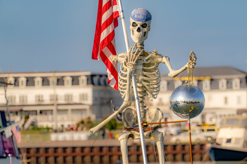 Random image of a pirate skeleton holding an American flag on Block Island, RI.