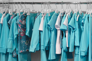 clothing for children and teenagers in children's clothing stores. clothes for children and teenagers in the store