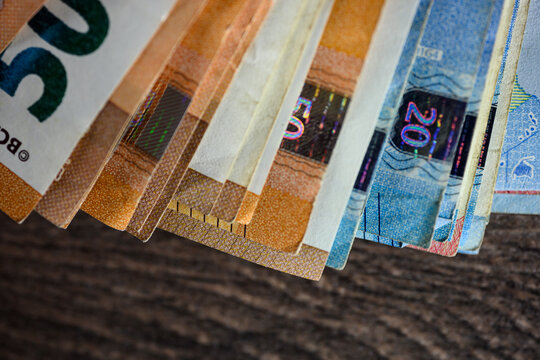 Euro bills close up. Close up shot of 50 and 20 euro bank notes. High quality photo