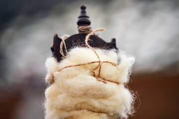 The spinning process involves twisting the fibers of the wool together to create a strong and...