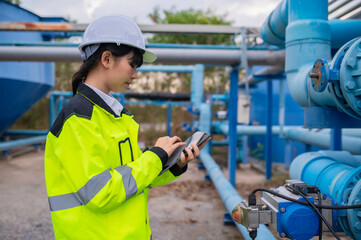 Environmental engineers work at wastewater treatment plants,Water supply engineering working at...