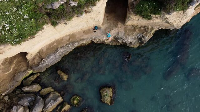 aerial view of the transparent water of Anzio in front of the caves