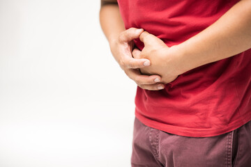 A red shirt man hand touching on stomach symptom of stomachache or stomach pain. Stomach pain and...