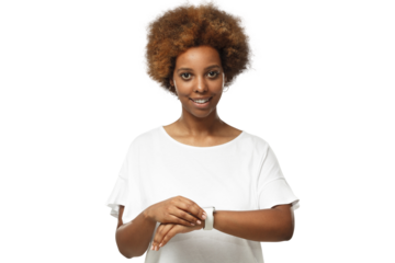 Young african american woman looking at camera, checking smartwatch, wearing wireless earphones and blank white t-shirt
