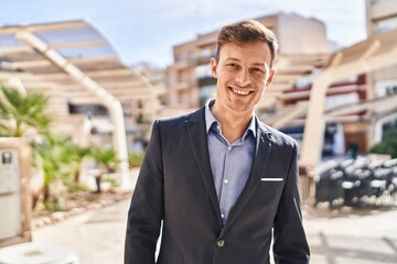 Young man business worker smiling confident standing at park