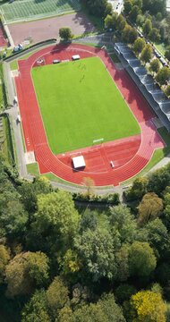 aerial drone flight over a soccer field in "Lübeck" germany