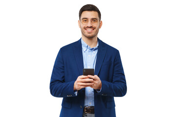 Young businessman or teacher holding phone, looking at camera with happy smile