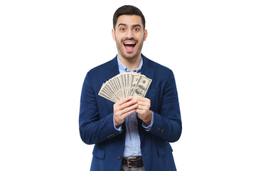 Young man holding fan of dollars in both hands, screaming with joy, winning money in lottery, feeling excited - obrazy, fototapety, plakaty